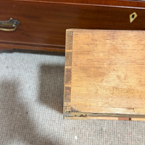 62 - An Edwardian mahogany Chest of Drawers, the top with geometric marquetry banding, applied with ivory... 
