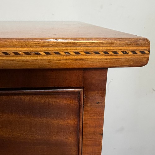 62 - An Edwardian mahogany Chest of Drawers, the top with geometric marquetry banding, applied with ivory... 