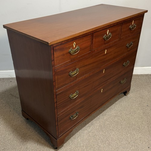 62 - An Edwardian mahogany Chest of Drawers, the top with geometric marquetry banding, applied with ivory... 