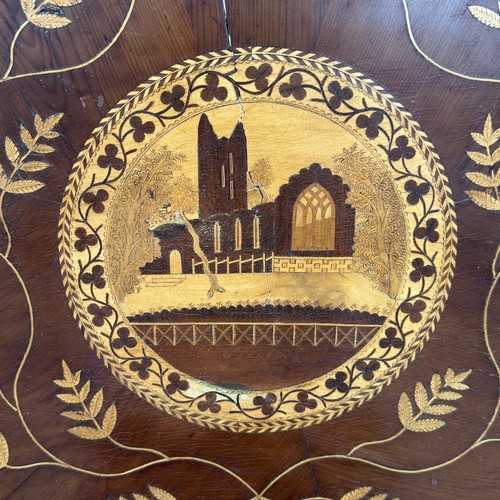 63 - An Irish Killarney marquetry and yew occasional Table, third quarter 19th century, the scalloped edg... 