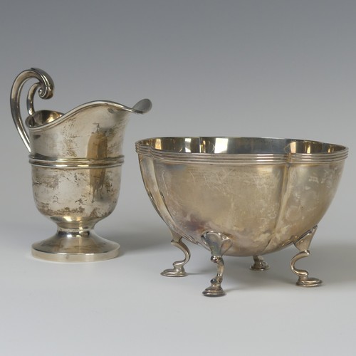 7 - An Edwardian silver Cream Jug, by James Deakin & Sons, hallmarked Sheffield, 1906, of helmet for... 
