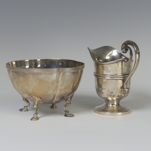 7 - An Edwardian silver Cream Jug, by James Deakin & Sons, hallmarked Sheffield, 1906, of helmet for... 
