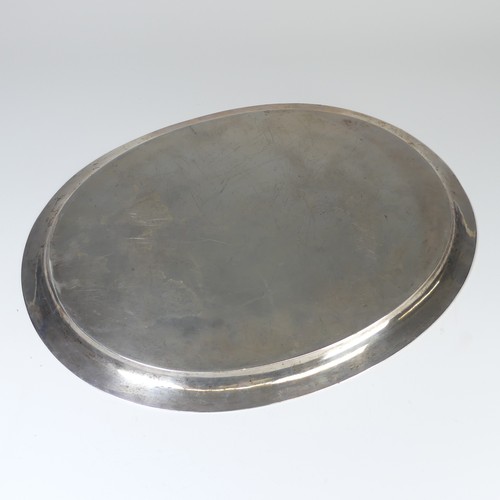 15 - An Iraqi silver oval Tray, the centre with depiction of the ruin of Ctesiphon, with presentation ins... 