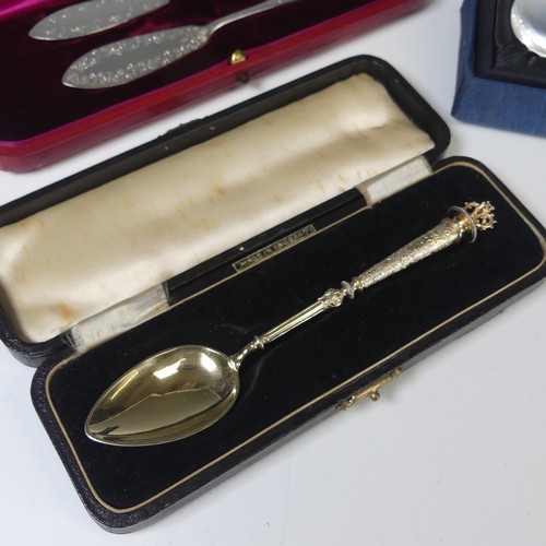 55 - A Continental silver gilt commemorative Spoon, with crown finial, marked 800, 15.7cm long, 27g, toge... 