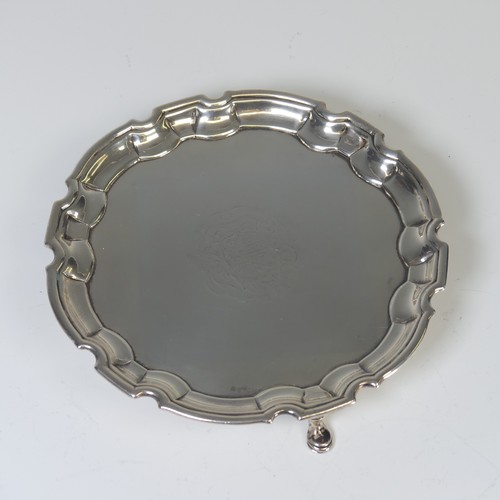 29 - A George II silver Waiter, by John Tuite, hallmarked London 1731, of shaped circular form and raised... 