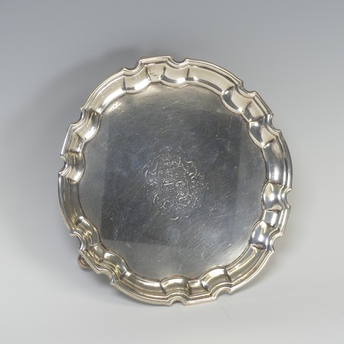 29 - A George II silver Waiter, by John Tuite, hallmarked London 1731, of shaped circular form and raised... 