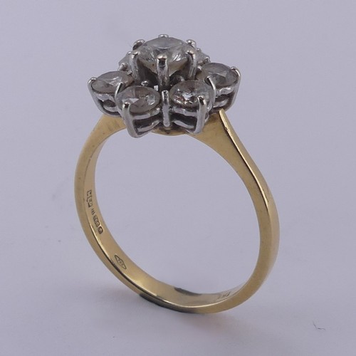 A diamond Cluster Ring, the central circular stone approx. 0.4ct, six ...