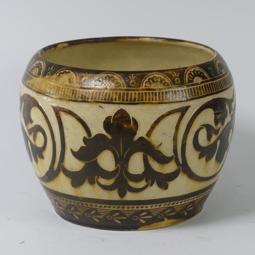 69 - A C. H. Brannam pottery Jardinière, dated 1852, decorated with scrolling foliage, incised 'C. H. Bra... 
