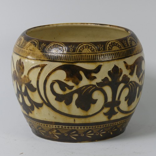 69 - A C. H. Brannam pottery Jardinière, dated 1852, decorated with scrolling foliage, incised 'C. H. Bra... 