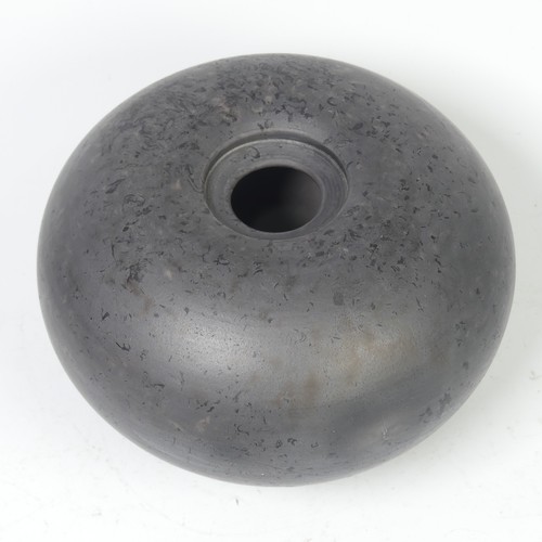 76 - Tim Andrews (b. 1960), a black smoke fired, lidded curling piece with cover,  impressed mark to unde... 