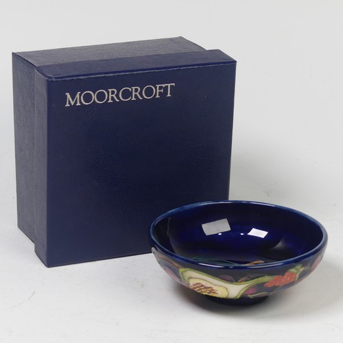 116 - A Moorcroft Pottery ‘Queen’s Choice’ pattern footed dish, by Emma Bossons, dated 2000, impressed mar... 