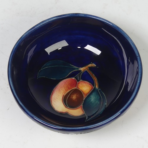 116 - A Moorcroft Pottery ‘Queen’s Choice’ pattern footed dish, by Emma Bossons, dated 2000, impressed mar... 