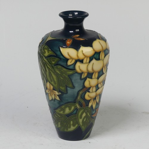 117 - A Moorcroft Pottery ‘Wisteria’ pattern Vase, by Philip Gibson, for ‘Moorcroft Collectors Club’, no.'... 