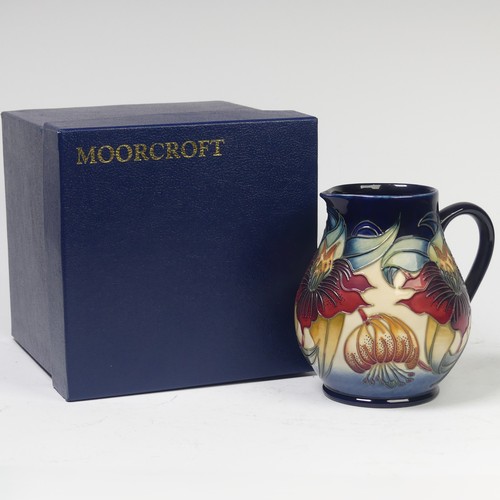 119 - A Moorcroft Pottery ‘Anna Lily’ pattern Jug, by Nicola Slaney, 20th century, marks to base, 15cm hig... 