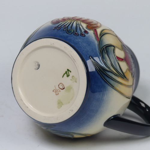 119 - A Moorcroft Pottery ‘Anna Lily’ pattern Jug, by Nicola Slaney, 20th century, marks to base, 15cm hig... 