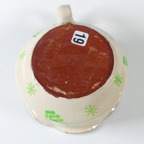 99 - A C. H. Brannam pottery motto Puzzle Jug, 20th Century, inscribed 'Within this Jug there is good Liq... 