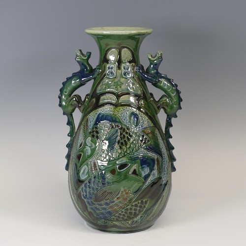 64 - A C.H. Brannam Pottery two-handled Vase, dated 1903, decorated in coloured enamels, with fish motif ... 