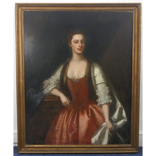 331 - Circle of Michael Dahl (Swedish 1656-1743), Portrait of a Lady, three-quarter length, in a red dress... 