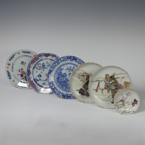 57 - A pair of Japanese porcelain plates, Meiji period, with Samurai preparing for battle scenes, painted... 