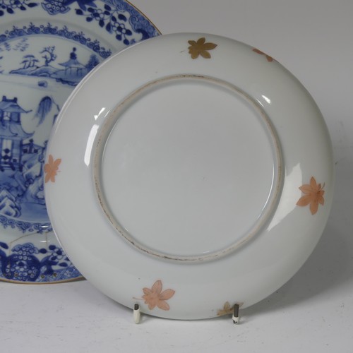 57 - A pair of Japanese porcelain plates, Meiji period, with Samurai preparing for battle scenes, painted... 