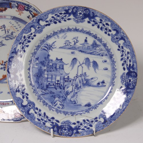 57 - A pair of Japanese porcelain plates, Meiji period, with Samurai preparing for battle scenes, painted... 