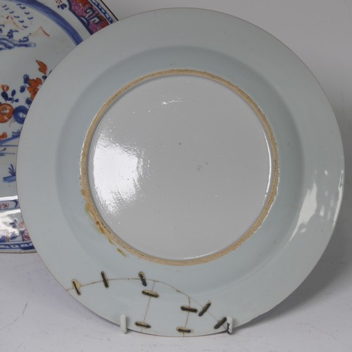 57 - A pair of Japanese porcelain plates, Meiji period, with Samurai preparing for battle scenes, painted... 