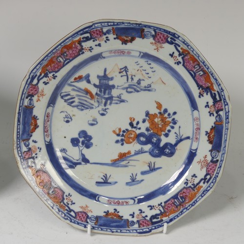 57 - A pair of Japanese porcelain plates, Meiji period, with Samurai preparing for battle scenes, painted... 