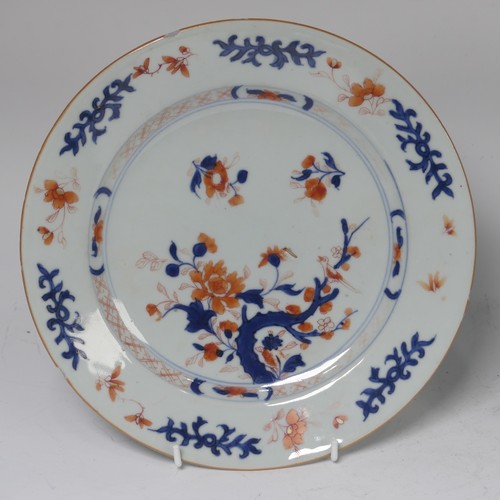 57 - A pair of Japanese porcelain plates, Meiji period, with Samurai preparing for battle scenes, painted... 