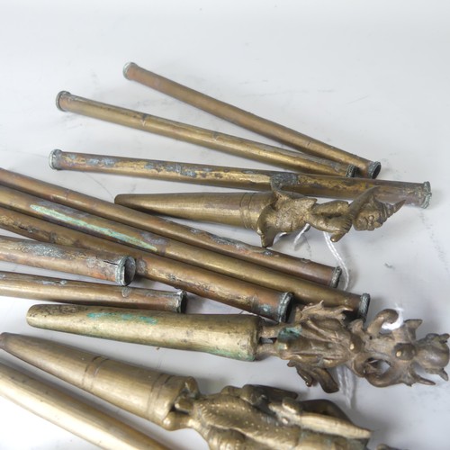 49 - A collection of eight bronze Burmese tattoo carved counterweights and needles, circa 19th century, i... 
