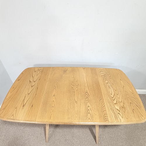 3 - An Ercol light elm and beech drop-leaf dining Table, No.383, W 137 cm x H 70 cm x D 75 cm.... 