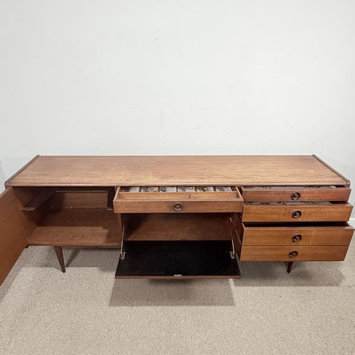 6 - A mid-20th century teak retro Sideboard, possibly designed by Robert Heritage, with central cutlery ... 