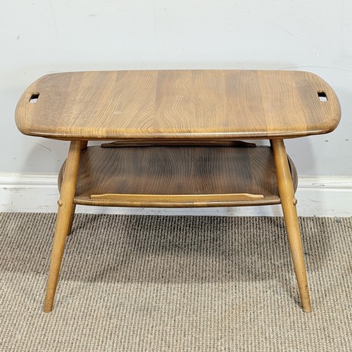 15 - An Ercol elm and beech 'Butlers Tray' coffee Table, No.457, with galleried under-tier raised on tape... 