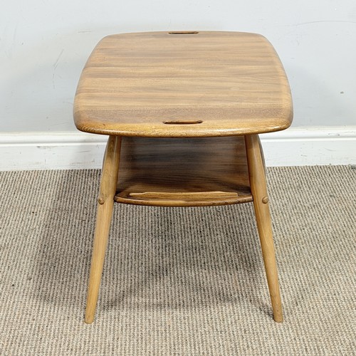 15 - An Ercol elm and beech 'Butlers Tray' coffee Table, No.457, with galleried under-tier raised on tape... 