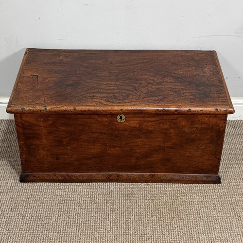 34 - An early 20th century elm Trunk, of small proportions, with gilt-metal carrying handles to either si... 