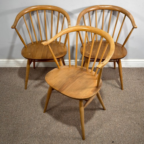 9 - Lucian Ercolani for Ercol; a set of three blonde elm and beech No.338 'Cowhorn' Chairs, W 56 cm x H ... 