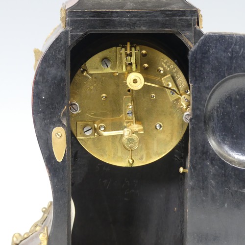 39 - A late 19th century Boulle type mantle Clock, the circular white dial applied with Roman numeral hou... 