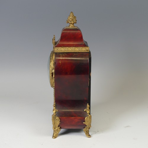 39 - A late 19th century Boulle type mantle Clock, the circular white dial applied with Roman numeral hou... 