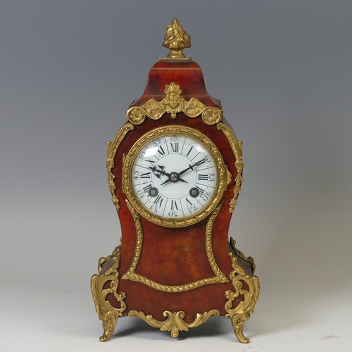 39 - A late 19th century Boulle type mantle Clock, the circular white dial applied with Roman numeral hou... 