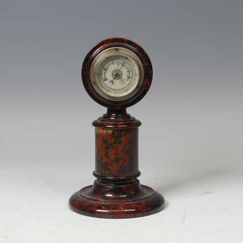 29 - A Cornish red serpentine desk-top Barometer, H 21 cm.