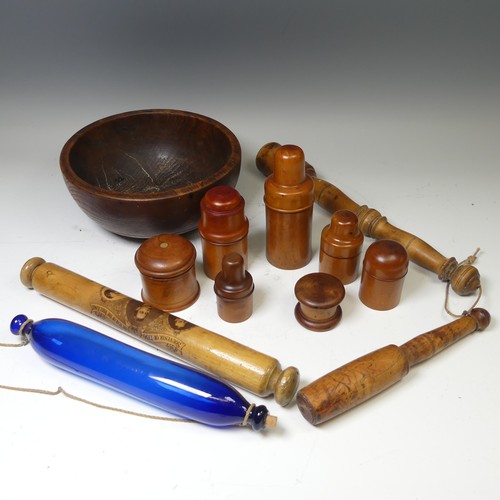 30 - A group of five treen medicine bottle Holders, 19th century and later, one stamped 'Gilbertson, Lond... 