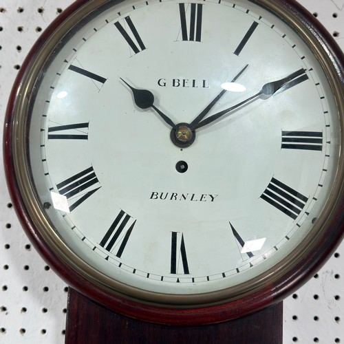 40 - An unusual 19th century mahogany drop dial wall Clock, the white circular dial applied with Roman nu... 