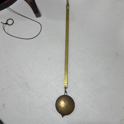 40 - An unusual 19th century mahogany drop dial wall Clock, the white circular dial applied with Roman nu... 