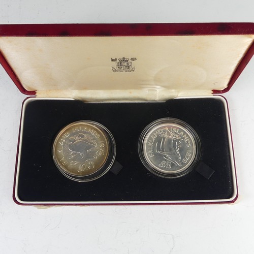 493 - Two Royal Mint Falkland Island commemorative silver Coins; £10 and £5 face values, dated 1979, total... 