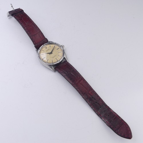 171 - A Rolex Oyster Perpetual stainless steel Wristwatch, ref. 6569, no. 35661*, the signed silvered dial... 