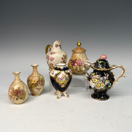 A Royal Crown Derby porcelain two handled four footed Vase, mid 20th Century, with painted ornithological panels and floral sprays, in coloured enamels and gilt, 12cm high, together with a 19th Century Staffordshire porcelain potpourri handled Vase, with encrusted flowers, decorated in coloured enamels and gilt, restored, 15cm high, and four further pieces of Royal Worcester Ivory and Blush Ivory, of different forms. (6)