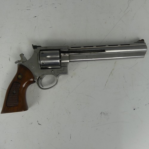 Deactivated; a Taurus .44 six-shot Revolver, with monogram inset to the chequered grips and 8.25 inch barrel, serial number NA860116, with de-activation certificate dated 08/09/2025, overall length 35 cm.