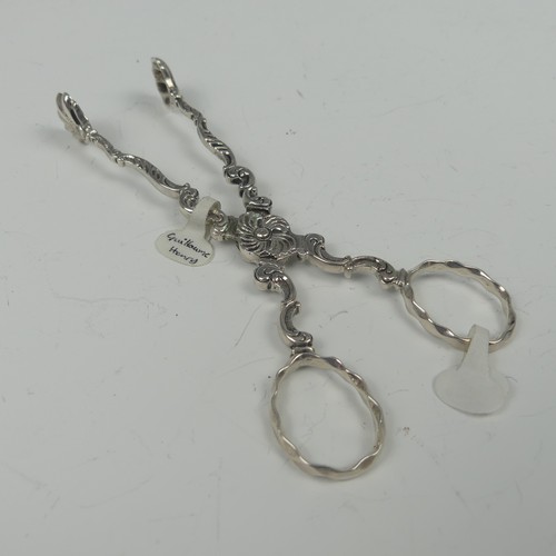 20 - A pair of mid-18thC silver scissor action Sugar Tongs, marked twice with makers mark a crowned GH, p... 