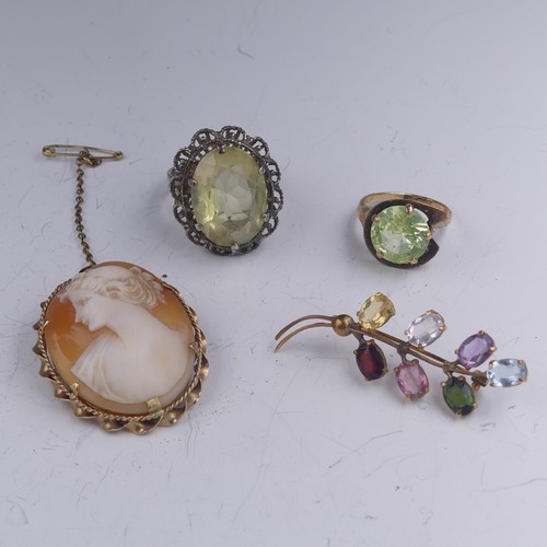 446 - A 9ct gold oval shell Cameo Brooch, 4cm long, 8.7g, a synthetic green spinel cocktail ring, mounted ... 