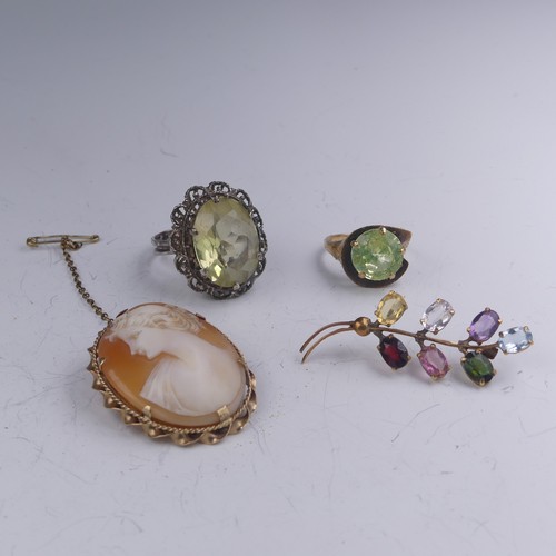 446 - A 9ct gold oval shell Cameo Brooch, 4cm long, 8.7g, a synthetic green spinel cocktail ring, mounted ... 
