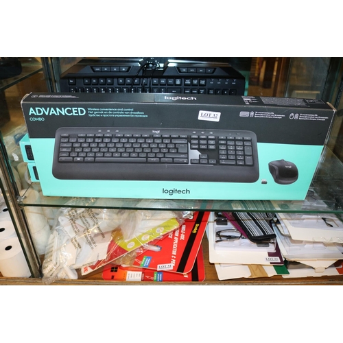 32 - X3 BOXED LOGITECH WIRELESS KEYBOARDS WITH MOUSE , AND PREDATOR GAMING KEYBOARD WITH MOUSE